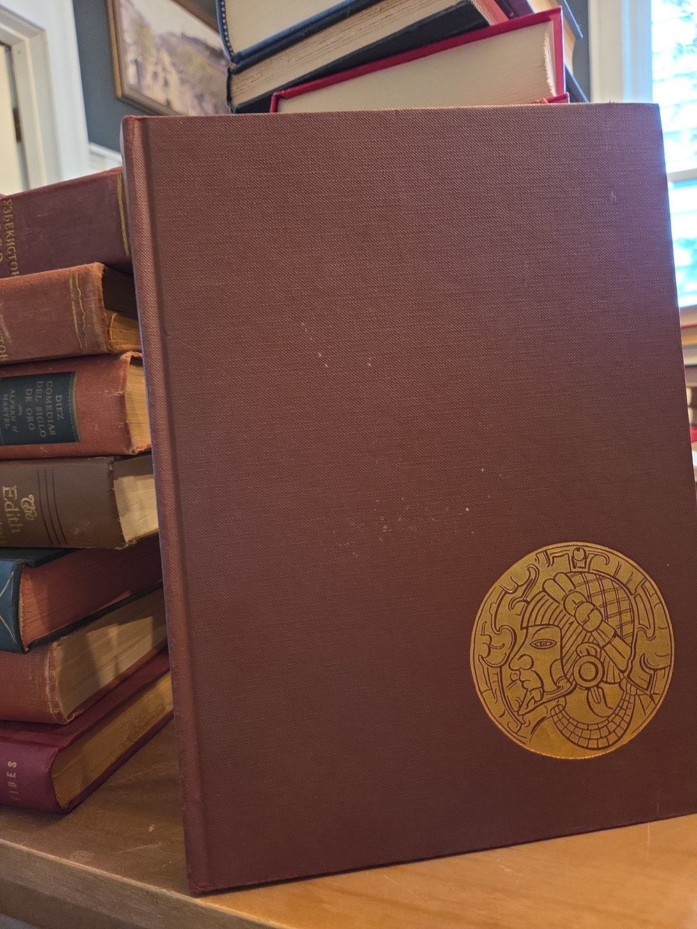 Classic Maroon Hardcover Book with Gold Emblem - Home Games